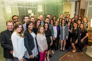 The Related Realty team toasts their first anniversary during a celebration at the brokerage’s Hubbard Street offices.