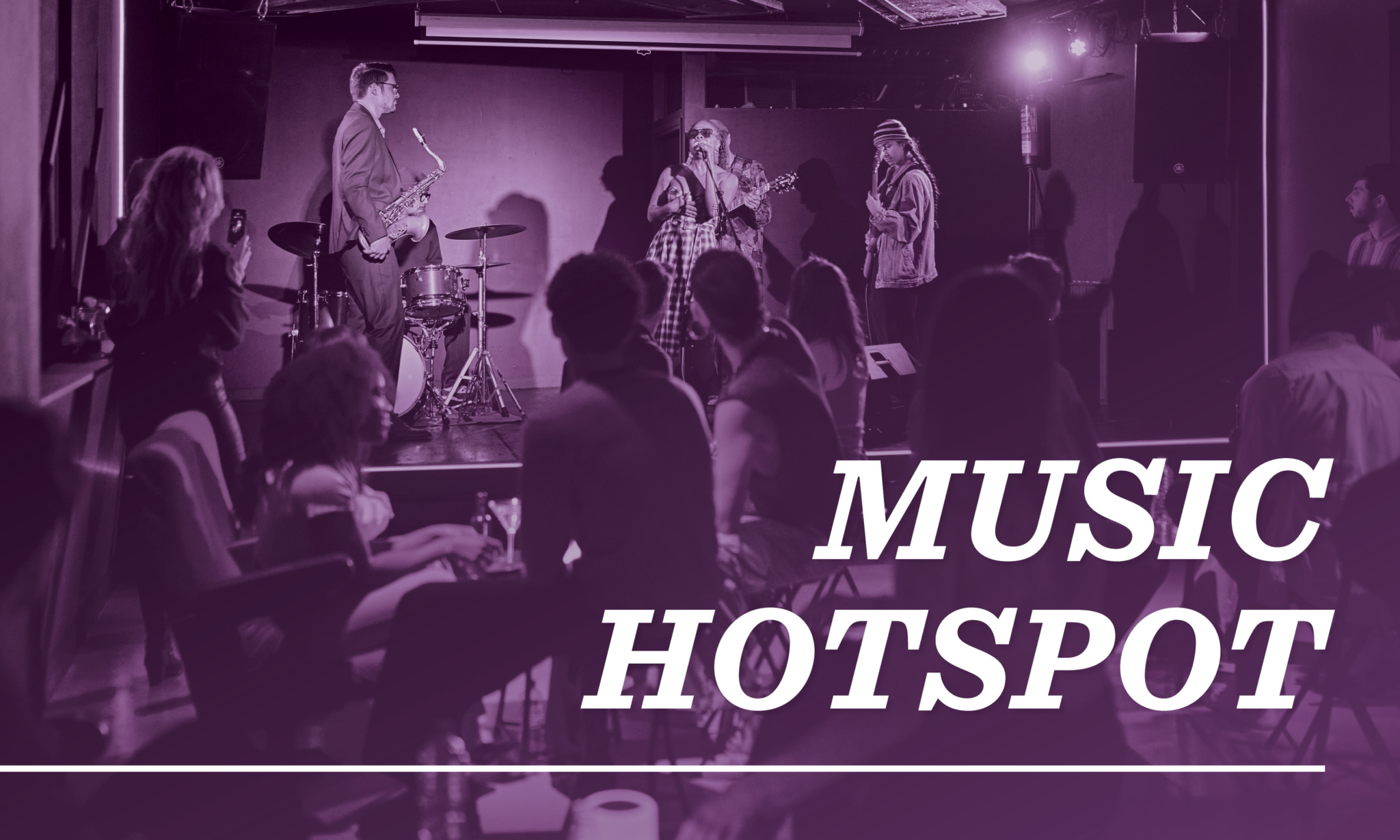 musicians play on a stage