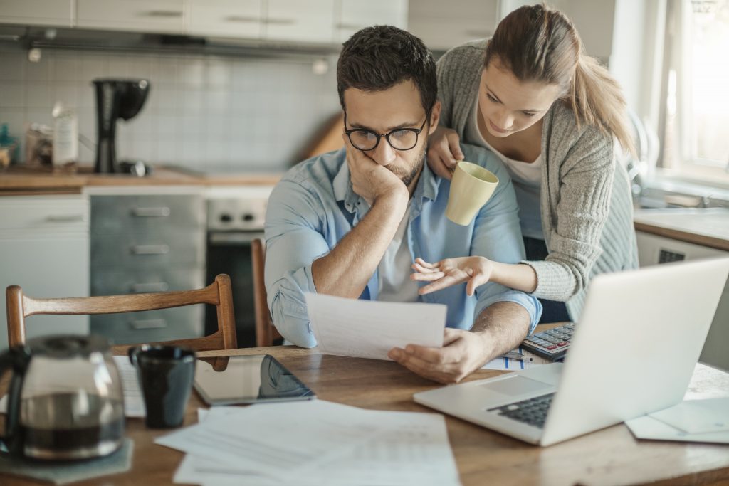 Photo of a young couple going through financial problems