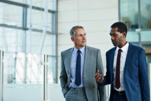 businessmen-walking-agents-real-estate-clients-buyers-sellers